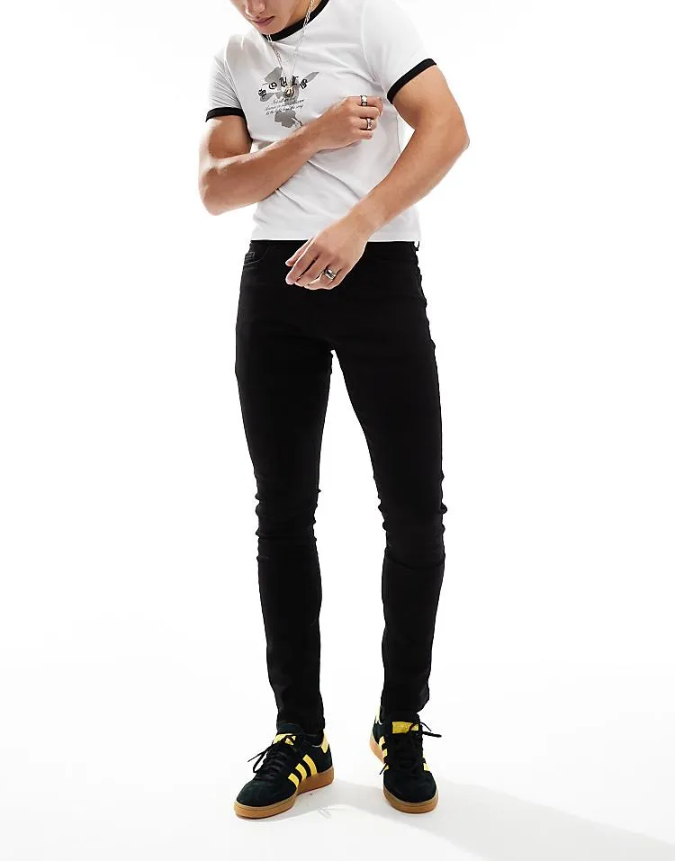 COLLUSION mid rise skinny jeans in washed black