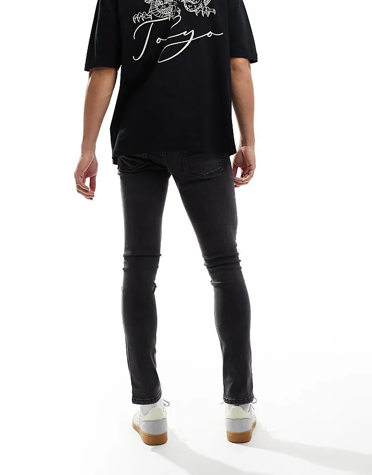 COLLUSION mid rise skinny jeans in washed black
