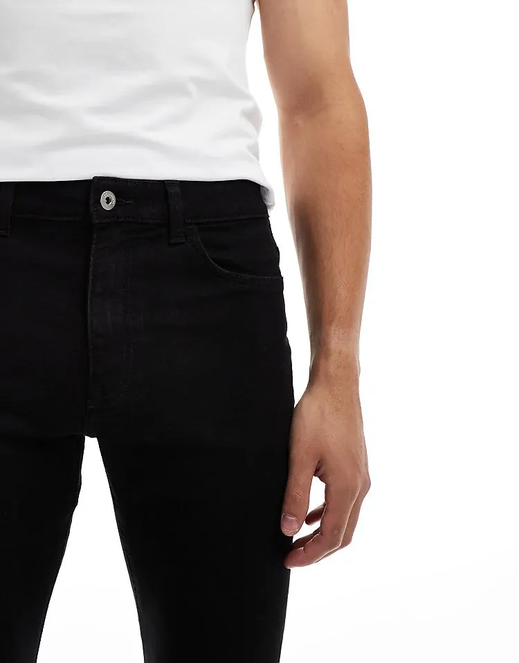 COLLUSION mid rise skinny jeans in washed black